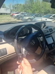 2014 Honda Odyssey - Interior Steering Wheel With Keys Image